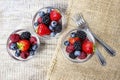 Fruit salad in small transparent bowls Royalty Free Stock Photo