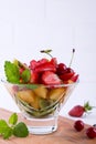 Fruit salad of strawberries, kiwis and apricots. Fresh and tasty snack, dessert