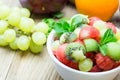 Fruit salad with strawberries, oranges, kiwi, grape and watermel
