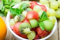 Fruit salad with strawberries, oranges, kiwi, grape and watermel