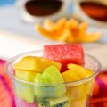 Fruit salad, sunglasses, book and starfish Royalty Free Stock Photo