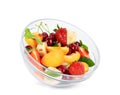 Fruit salad in a transparent plate on a white background Royalty Free Stock Photo