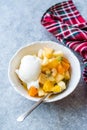 Fruit Salad with Vanilla Ice Cream in Ceramic Bowl Royalty Free Stock Photo