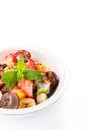 Fruit salad on the white plate vertical Royalty Free Stock Photo