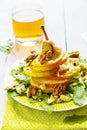 Fruit salad, whole pear sliced, walnuts caramelized in honey, blue cheese and arugula.