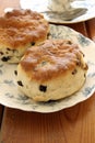 Fruit scones and afternoon tea Royalty Free Stock Photo