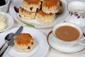 Fruit scones with tea. Royalty Free Stock Photo