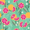 Fruit seamless pattern, grapefruit with branches, leaves and flowers on green background. Summer vibrant design. Exotic tropical Royalty Free Stock Photo