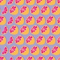 Fruit seamless pattern, grapefruit halves and slices on purple background. Summer vibrant design. Exotic tropical fruit Royalty Free Stock Photo