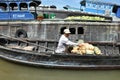 Fruit seller in the Cai Rang Floating market, Mekong delta, Vietnam Royalty Free Stock Photo