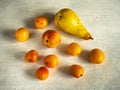 Fruit set of pear, apricot and nectarine on a bright table, top view Royalty Free Stock Photo