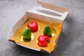 fruit-shaped mousse cakes in a box