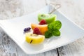 Fruit skewer on a white platter