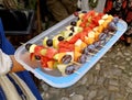 Fruit skewers appetizers made of plums, watermelon, melon, white grapes, apple and red grapes Royalty Free Stock Photo