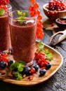 Fruit Smoothies With Red Currants, Blueberry, Banana, Goji Berries And Chia Seeds