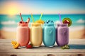 Fruit smoothies with various flavors with a beach background Royalty Free Stock Photo