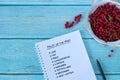 Fruit of the Spirit handwritten words with a bowl of fresh currants, top view