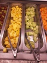 Pineapple and melon on a salad bar Royalty Free Stock Photo