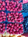 Fruit stall with strawberries, plums, grape and citruses Royalty Free Stock Photo