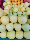 Closeup to yellow apples on fruit stall