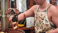 Fruit on a stick being dipped in Chocolate fountain 2 Royalty Free Stock Photo