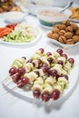 Fruit sticks with grapes,apple, melon, pear Royalty Free Stock Photo