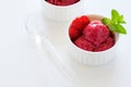 Fruit strawberry sorbet with mint in bowl on white wooden background Royalty Free Stock Photo