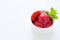 Fruit strawberry sorbet with mint in bowl on white wooden background Royalty Free Stock Photo