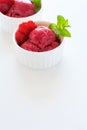 Fruit strawberry sorbet with mint in bowl on white wooden background Royalty Free Stock Photo