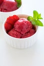 Fruit strawberry sorbet with mint in bowl on white wooden background Royalty Free Stock Photo