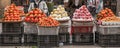 Fruit street vendors at Lao Kai, Vietnam-China border. Vietnamese woman street venders with orange, apple, chinese pear and Royalty Free Stock Photo