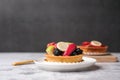 fruit tart or dessert topped with dragon fruit, blackberry, and apple Royalty Free Stock Photo