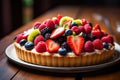 a fruit tart on a plate