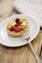 Fruit tart on a whie plate Royalty Free Stock Photo