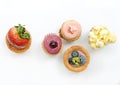 Fruit tarts on white background (top view)