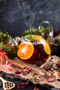 Fruit tea. Seasonal winter autumn hot drink. Citrus and berry tea with lemon, oranges Royalty Free Stock Photo