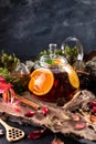 Fruit tea. Seasonal winter autumn hot drink. Citrus and berry tea with lemon, oranges Royalty Free Stock Photo