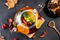 Fruit tea. Seasonal winter autumn hot drink. Citrus and berry tea with lemon, oranges and mint Royalty Free Stock Photo