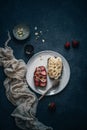 Fruit toasts with honey, banana, sliced strawberry. Healthy and nutritious lunch.