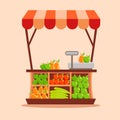 Fruit trade stall. Outdoor stand with canopy and fresh vegetables organic trade. Royalty Free Stock Photo