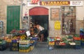Fruit and Vegatable shop in the old town of Soller with female shopper.