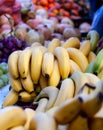 Pile of fresh banana and other fruits at a market stall. Fruit and vegetable market Royalty Free Stock Photo