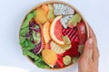 fruit and vegetable salad or orange, dragon fruit and lettuce salad