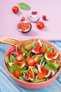 Fruit and vegetable salad with wooden fork, concept of healthy lifestyle and nutrition Royalty Free Stock Photo