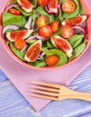 Fruit and vegetable salad with wooden fork, concept of healthy lifestyle and nutrition Royalty Free Stock Photo