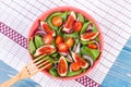 Fruit and vegetable salad with wooden fork, concept of healthy lifestyle and nutrition Royalty Free Stock Photo