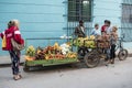 Fruit and vegetable seller in street of Havana, Cuba. Vendor with tropical fruits and vegetals. Royalty Free Stock Photo