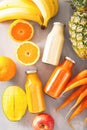 Fruit And Vegetable Smoothies In Glass Jars, Orange Mango Banana