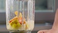 Fruit and vegetables being blended in a liquidiser