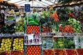 Fruit and vegetables shoppers at fruit and vegetables vendor